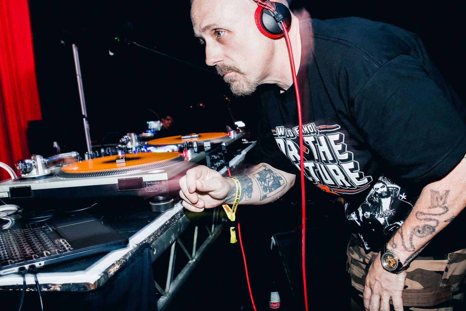 DJ Revolution on the turntables at a concert in Los Angeles